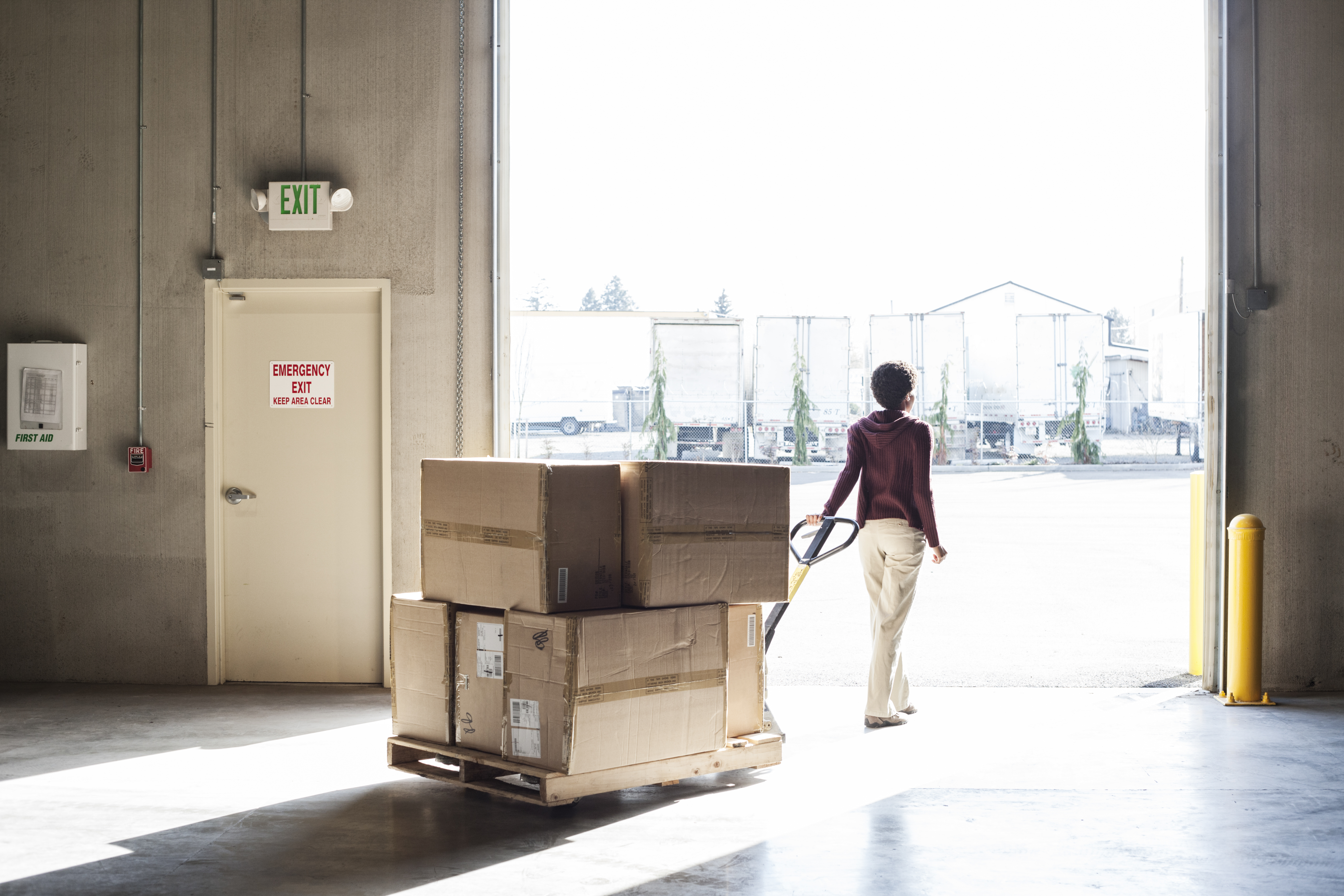 Person Pulling a Shipping Palette